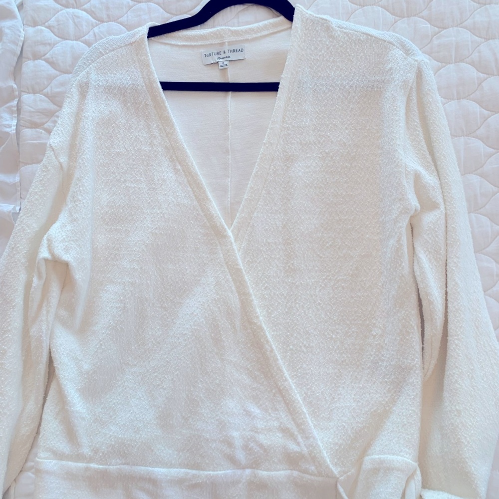 Texture and Thread White textured Wrap Blouse with tie detail.